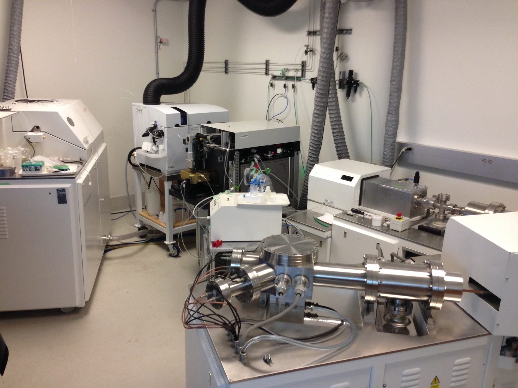 Mass spectrometers and a laser ablation system in the UCSB laboratory
